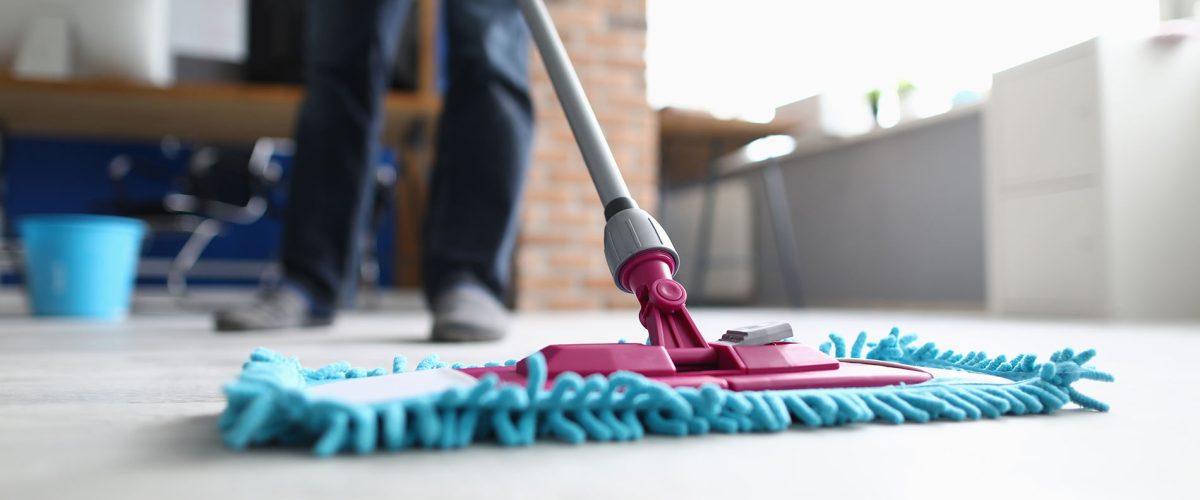 Office cleaning in San Mateo County with a blue mop.